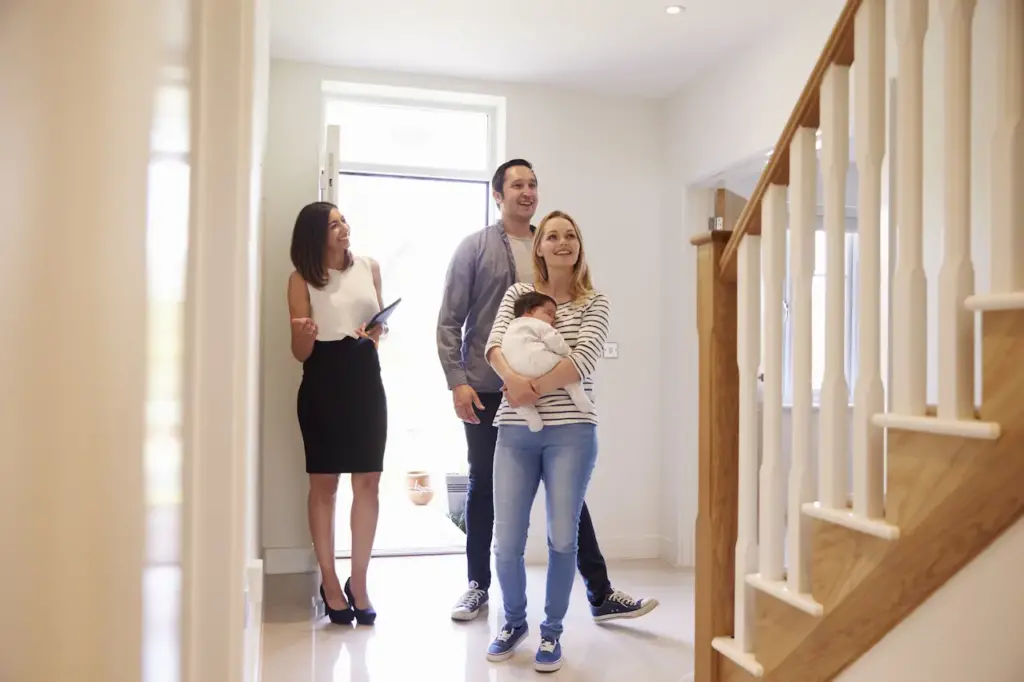 Buyer Agent Showing the Family Their New House 