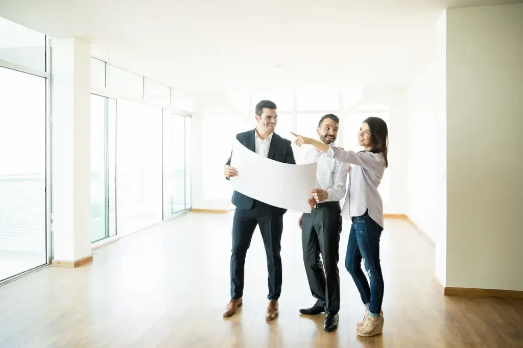 The Buyer Agent Showed The Floor Plan to the Couple 